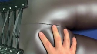Playing a bubble ass in leather leggings