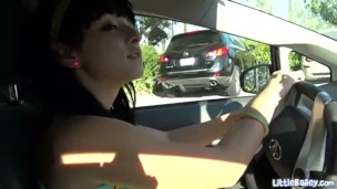 teen toys her tight cunt in a car