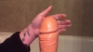 Oiling up my thick dildo