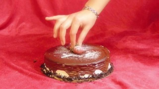 Kinky sweet girl sits down on a cake Foodporn