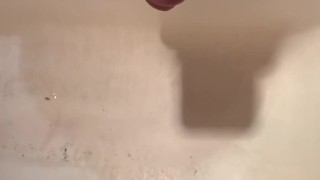 The guy in the bathroom jerked off his fat dick and cummed