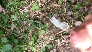 Cumshot on found condom outdoor