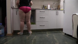 Housewife mature BBW MILF in red panties in the kitchen.