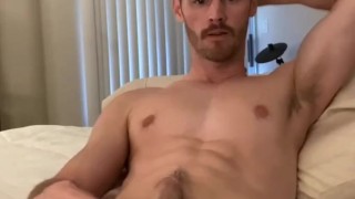 Dan Benson plays with his big cock and tight hole
