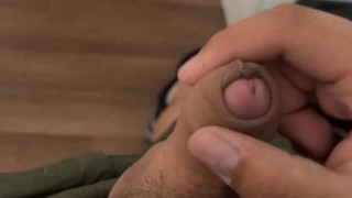 Chub jerks cock on edge of bed and cums on belly