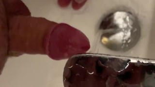 Washing small dick in bathroom sink
