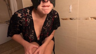 Juicy MILF with big tits closed herself in the toilet from her husband and rubs her pussy