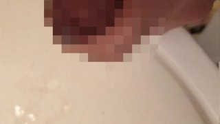 Hairy Japanese man masturbates. The moment he ejaculates in the washroom. Opposite viewpoint