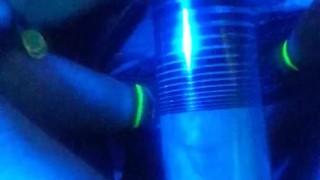 pumping dick and balls into penis pump under blue light