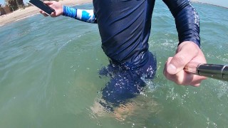 Surfer gets erect in his lycra for the pleasure of the people