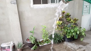 Handsome sexy man yard bathes for everyone to see