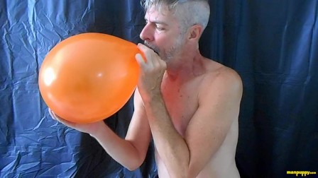 Gay daddy pops and rubs his big cock against balloons