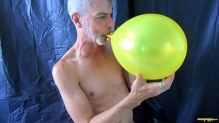 Gay daddy pops and rubs his big cock against balloons