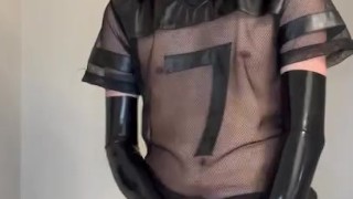 Rubber Pup Strokes Rubber Cock