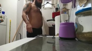 Chubby hairy guy jerking off in the kitchen after his coffee and made a mess with his load