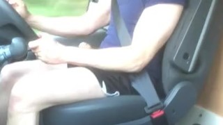 Muscular trucker bodybuilder Daddy jerks off and flexes muscles while driving his truck.