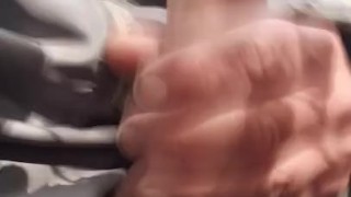 Masturbating massive dick out a whole in ski suit with cum shot