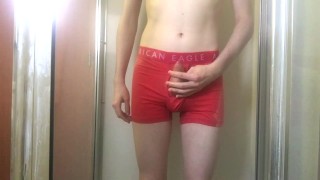 College Twink Pissing in Pink Trunks and Getting Hard