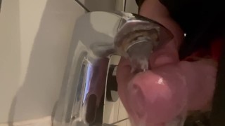Washing uncut cock in public restroom