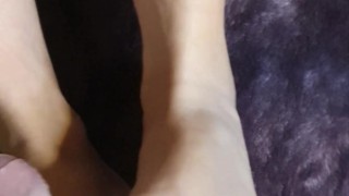 MILF wife giving footjob, rubbing fat cock with clean feet