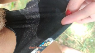 Wetting bikini with my urine under palm trees during vacation