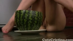 Cute Cristina plays naked with watermelon