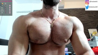 flexing my big muscles and jerk my hard cock