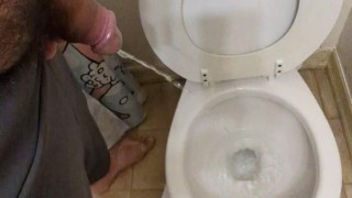 Piss fetish: Hung and hairy bear takes a leak