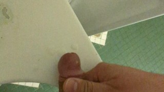 Risky Wank: horny hung bear jerks in a public university restroom, leaves sticky cum