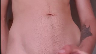 Cute guy masturbate Infront of window