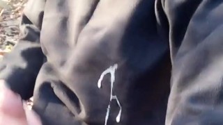 Huge cumshot on black shirt in the park