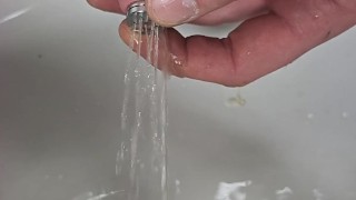 Piss hole sounding with a sprinkler rod
