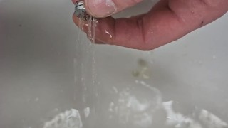 Urethral Sounding with a sprinkler end , pissing through it