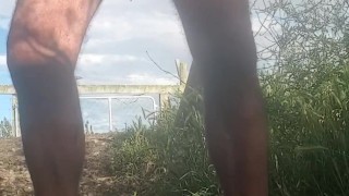 Quick piss in bare feet, long rubber gloves and dirty white shorts