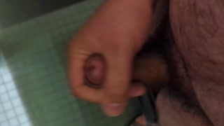 Hung bear jerks off in university restroom stall, blows big sticky load on the wall