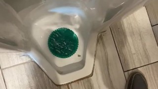 Taking A Leak In A Tall Urinal At A Gas Station