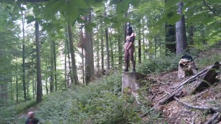 Standing pissing in a woods in a bunny mask and fishnet