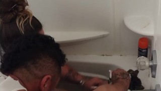 Pretty girl gives kitten a bath