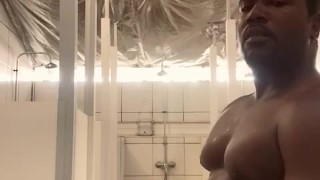 Black big dick jerking in the gym shower