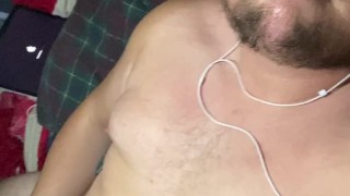 Cute young chubby bear shoots his load