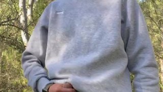 Horny boy pee and wanking outdoor in the woods