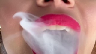 Smoking and showing off to a fan in a video call