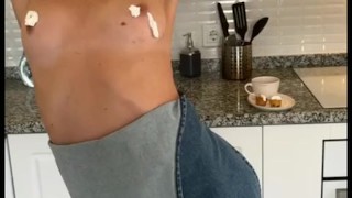 A beautiful milf while cooking dinner decided to sweetly masturbate her pink pussy