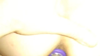 Sex with an anal plug in the ass