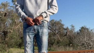 Horny twink having a big cum close to railway