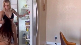 Licking her wet pussy in the fridge