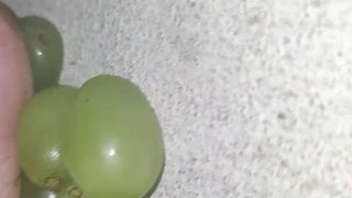Smashing juicy grapes under my big toes close up under and side pov