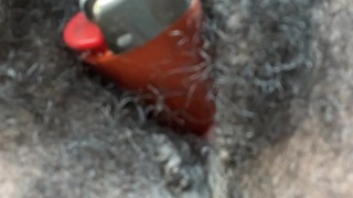 hairy ebony pussy swallows and squirts out lighter
