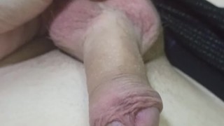 Showing his balls and cock