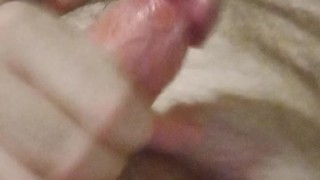 Bearded hairy man cumming on his own chest